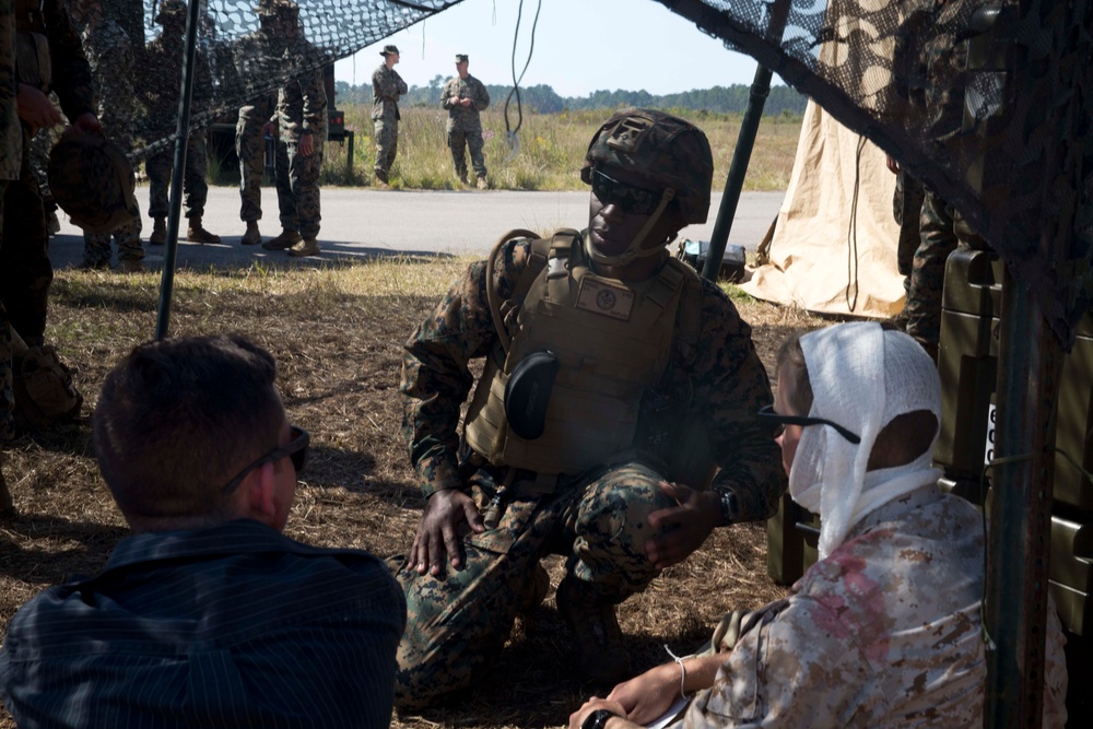 Sailors and Marines conduct a mass casualty evacuation