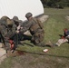 Sailors and Marines conduct a mass casualty evacuation