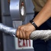 Sailor wraps Mooring Line