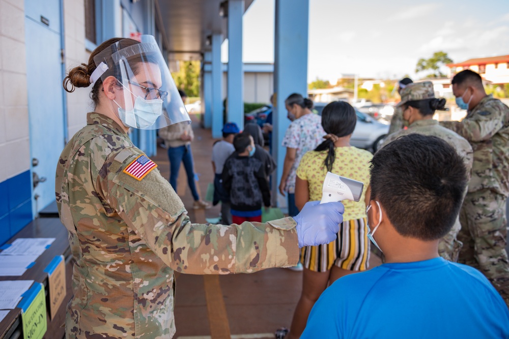 Hawaii National Guard Assists the Department of Health with Flu Vaccinations at Honowai Elementary