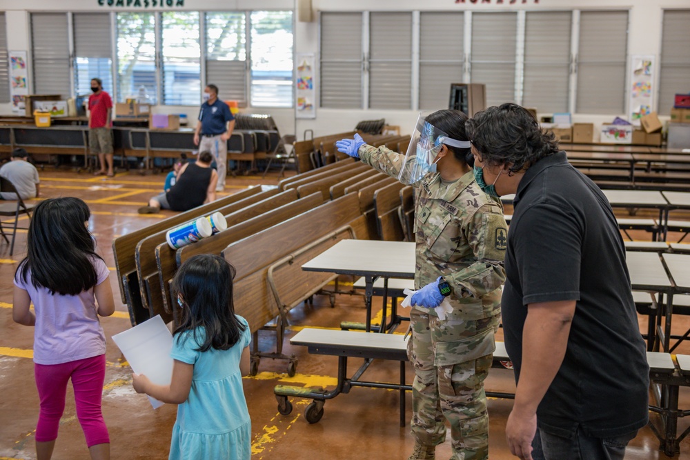 Hawaii National Guard Assists the Department of Health with Flu Vaccinations at Honowai Elementary