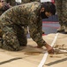 15th MEU infantry Marines build terrain model aboard USS Makin Island