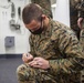 15th MEU infantry Marines build terrain model aboard USS Makin Island