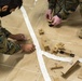 15th MEU infantry Marines build terrain model aboard USS Makin Island