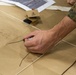 15th MEU infantry Marines build terrain model aboard USS Makin Island