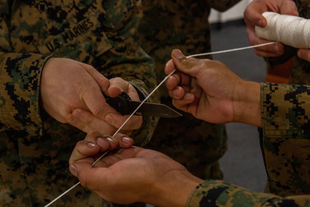 15th MEU infantry Marines build terrain model aboard USS Makin Island