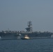 Bahrain Coast Guard escorts the USS Nimitz through the Gulf of Bahrain for maintenance and logistics visit