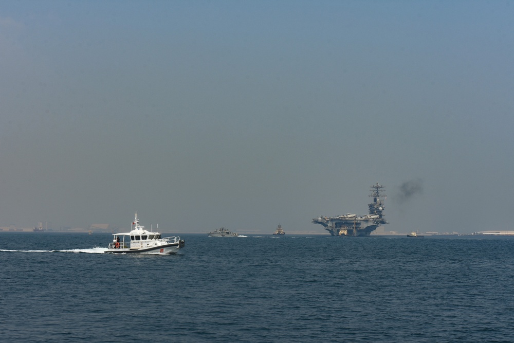 Bahrain Coast Guard escorts the USS Nimitz through the Gulf of Bahrain for maintenance and logistics visit