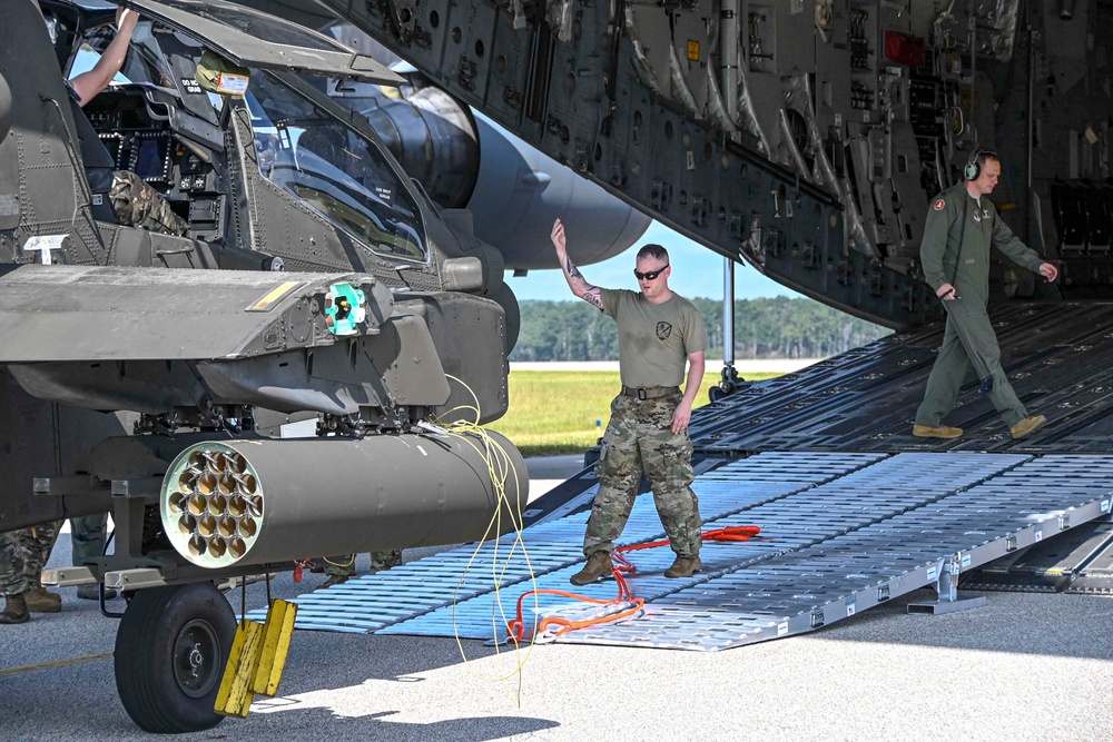 Apache helicopters transported for live-fire exercise