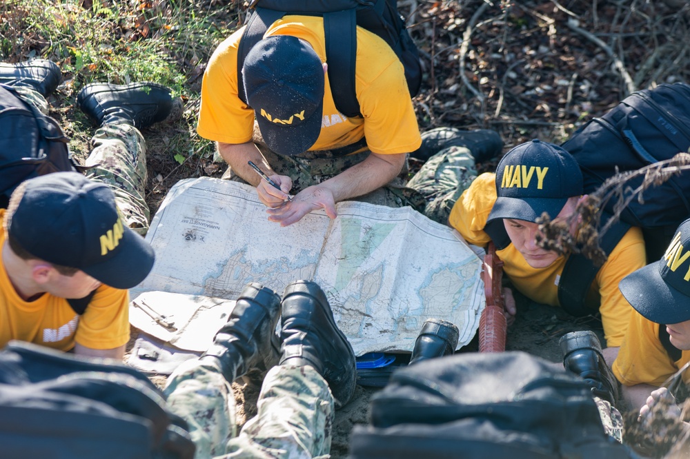 201014-N-TE695-0039 NEWPORT, R.I. (Oct. 14, 2020)  Navy Officer Candidate School (OCS) students navigate during battle stations