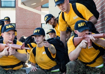 201014-N-TE695-0044 NEWPORT, R.I. (Oct. 14, 2020)  Navy Officer Candidate School (OCS) students manuver to extraction point during battle stations
