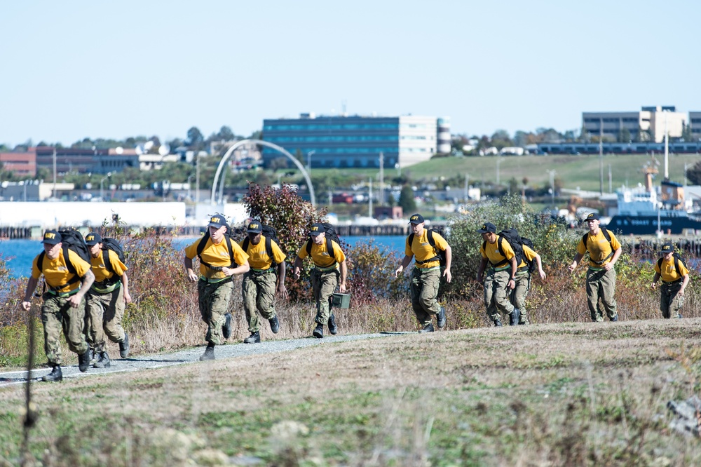 201014-N-TE695-0046 NEWPORT, R.I. (Oct. 14, 2020)  Navy Officer Candidate School (OCS) students manuver to extraction point during battle stations