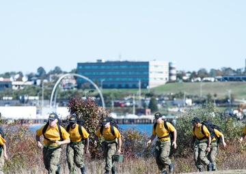 201014-N-TE695-0046 NEWPORT, R.I. (Oct. 14, 2020)  Navy Officer Candidate School (OCS) students manuver to extraction point during battle stations