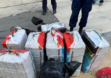 Coast Guard transfers 6.8 million in seized cocaine, 4 suspected smugglers to federal agents in San Juan, Puerto Rico