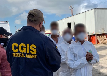 Coast Guard transfers 6.8 million in seized cocaine, 4 suspected smugglers to federal agents in San Juan, Puerto Rico