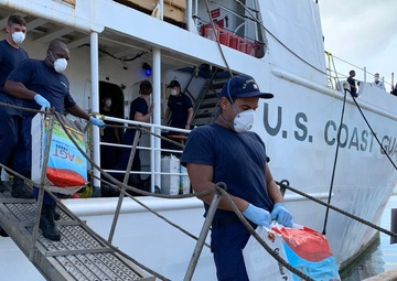 Coast Guard transfers 6.8 million in seized cocaine, 4 suspected smugglers to federal agents in San Juan, Puerto Rico