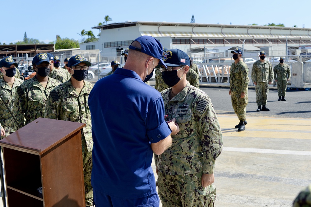 Coast Guard presents Navy with Meritorious Team Commendation Ribbon