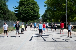 Runners sweat during Dog Days 5K