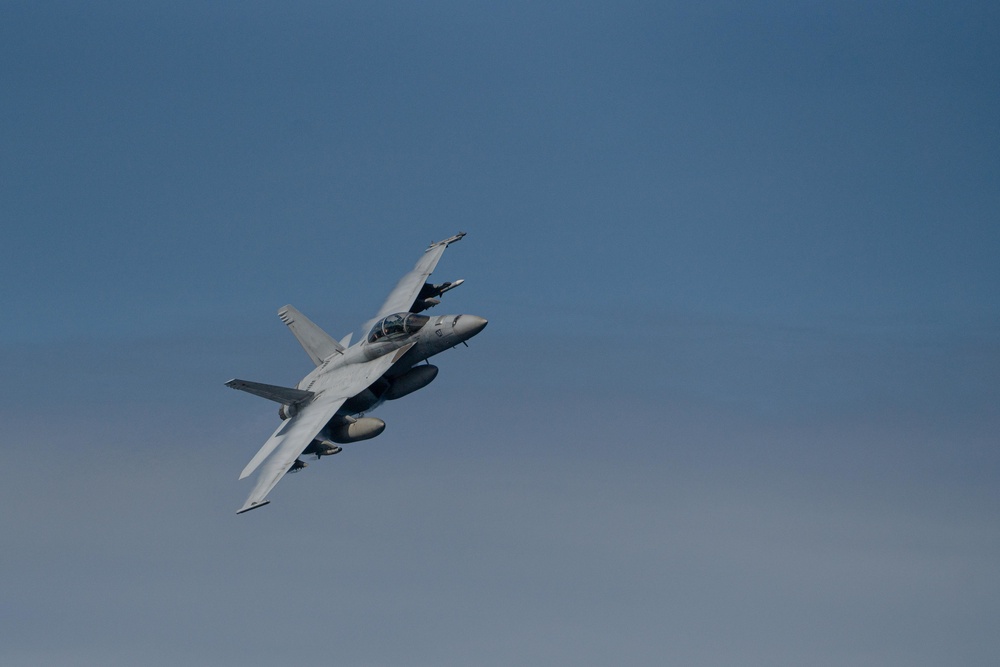 Strike Fighter Squadron (VFA) 102 Conducts Fly-by