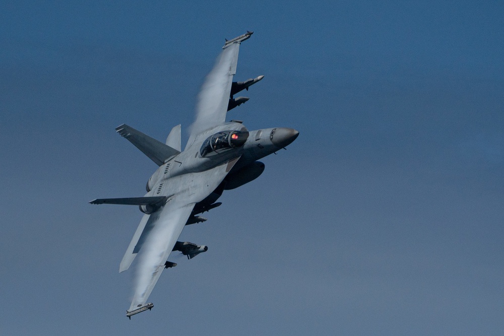 Strike Fighter Squadron (VFA) 102 Conducts Fly-by