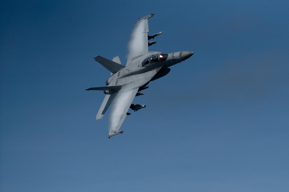 Strike Fighter Squadron (VFA) 102 Conducts Fly-by