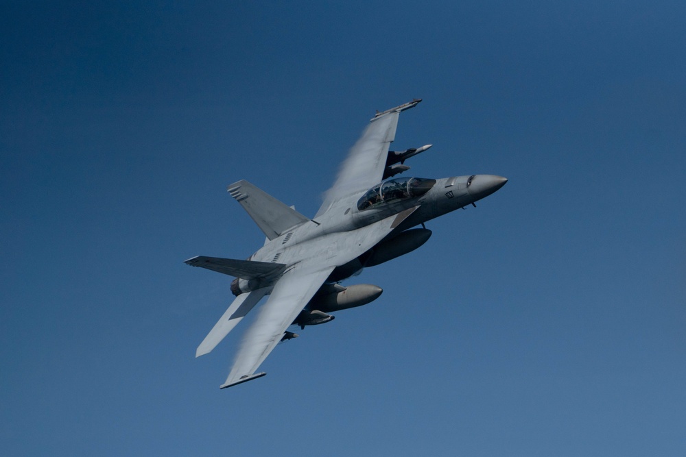 Strike Fighter Squadron (VFA) 102 Conducts Fly-by