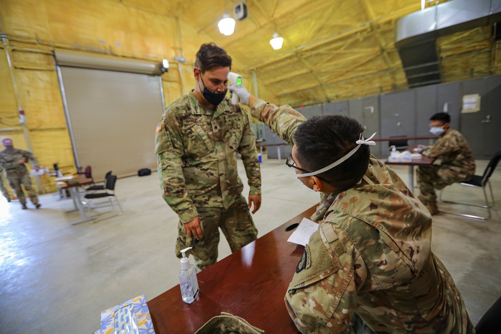 1st BCT Air Assault Soldiers provide COVID screening for 3rd BCT OPFOR