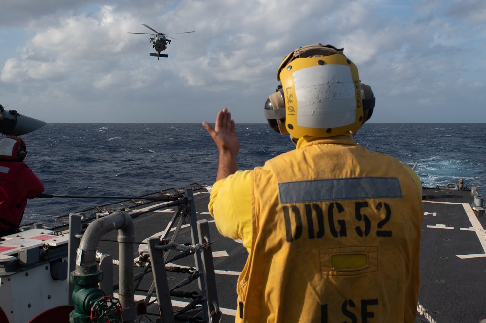 USS Barry Conducts a Vertical Replenishment with USS America