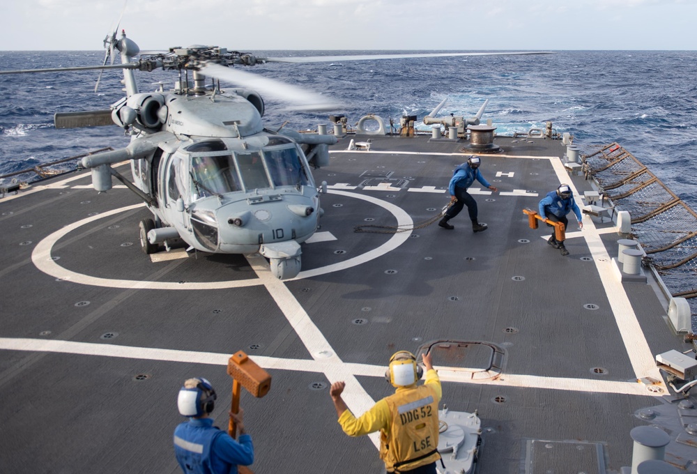 USS America Helicopter Lands Aboard USS Barry