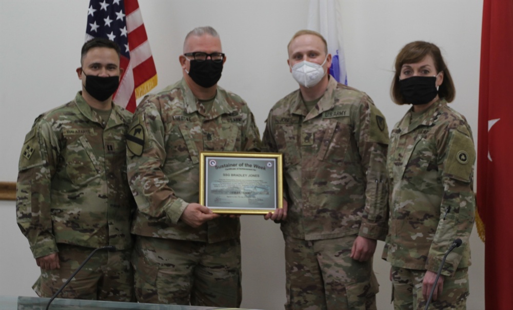 1st Theater Sustainment Command Awards Sustainer of the Week to Staff Sgt. Bradley Jones