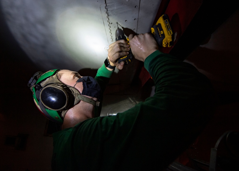 Sailor Drills Out Screw