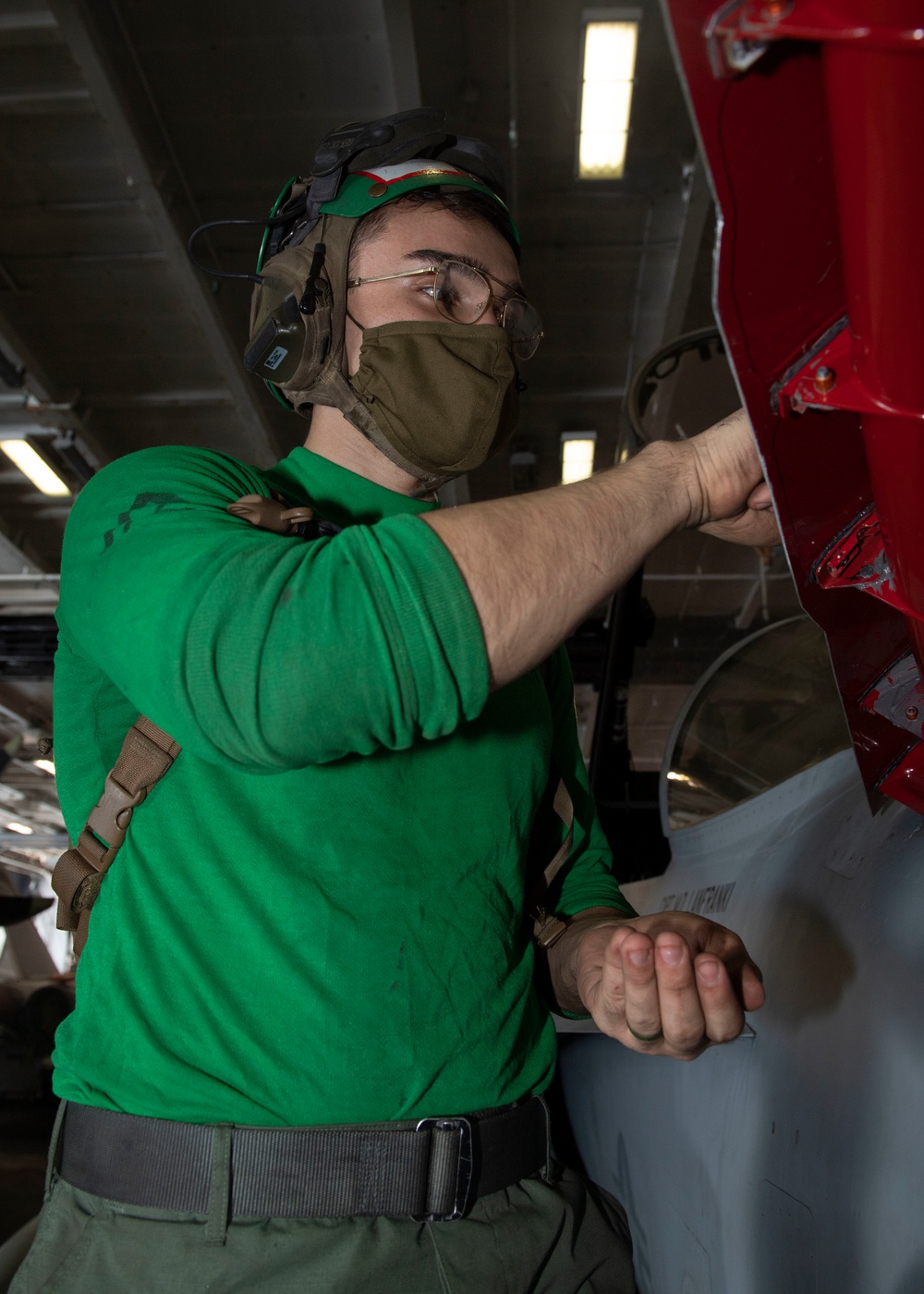 Sailor Conducts Maintenance