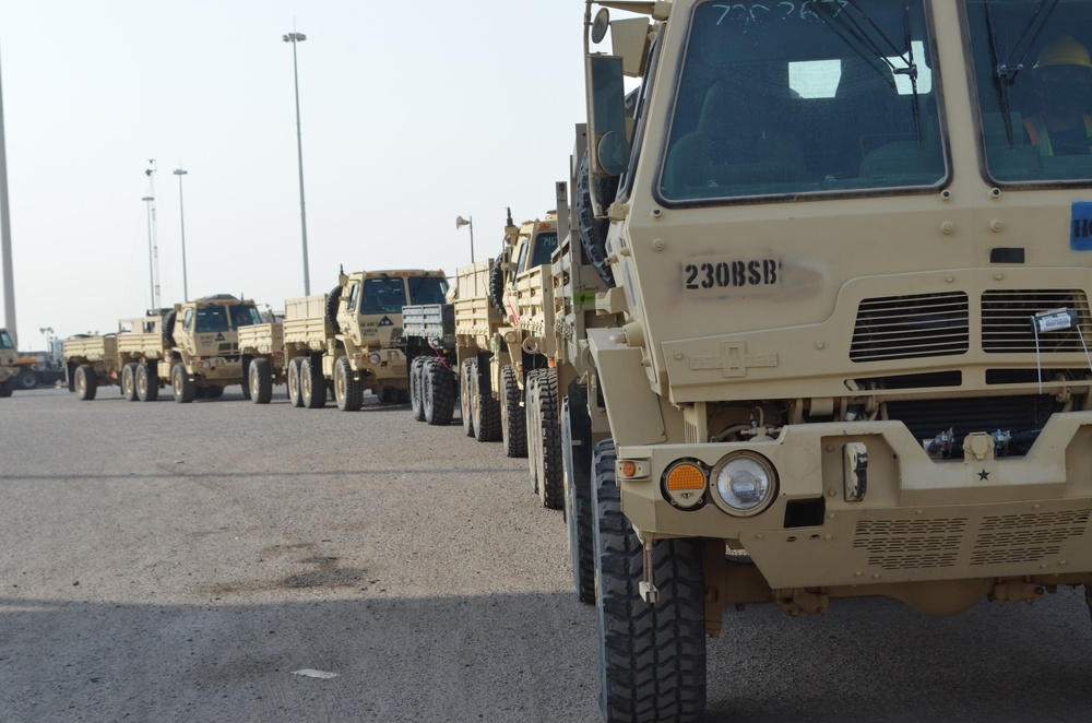 FMTVs during a convoy in Kuwait