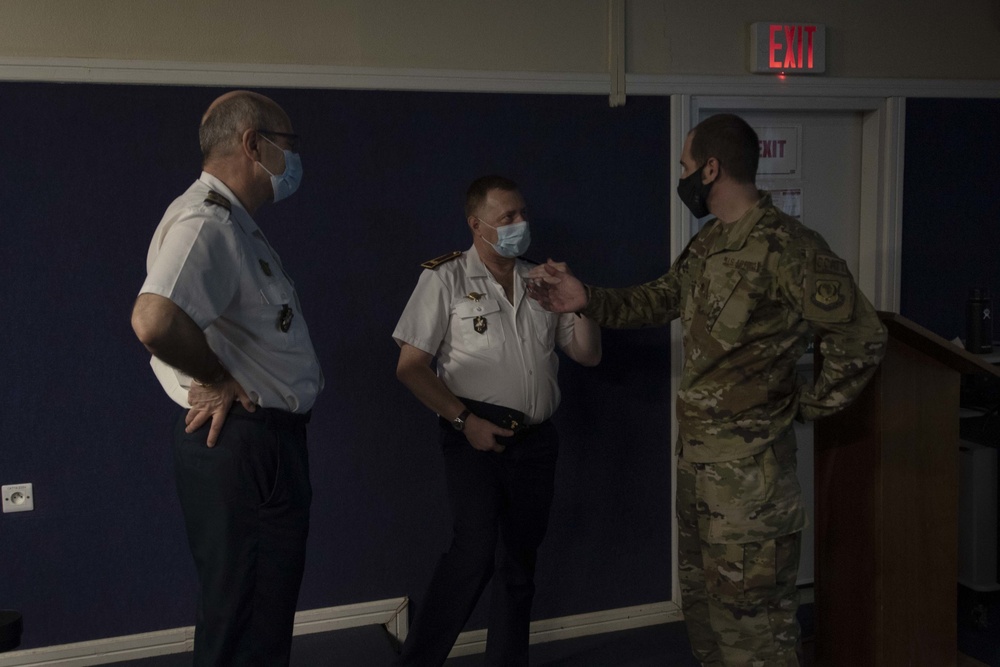 Foreign Military Medical Personnel discuss COVID-19