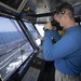 Sailor Scans Flight Deck