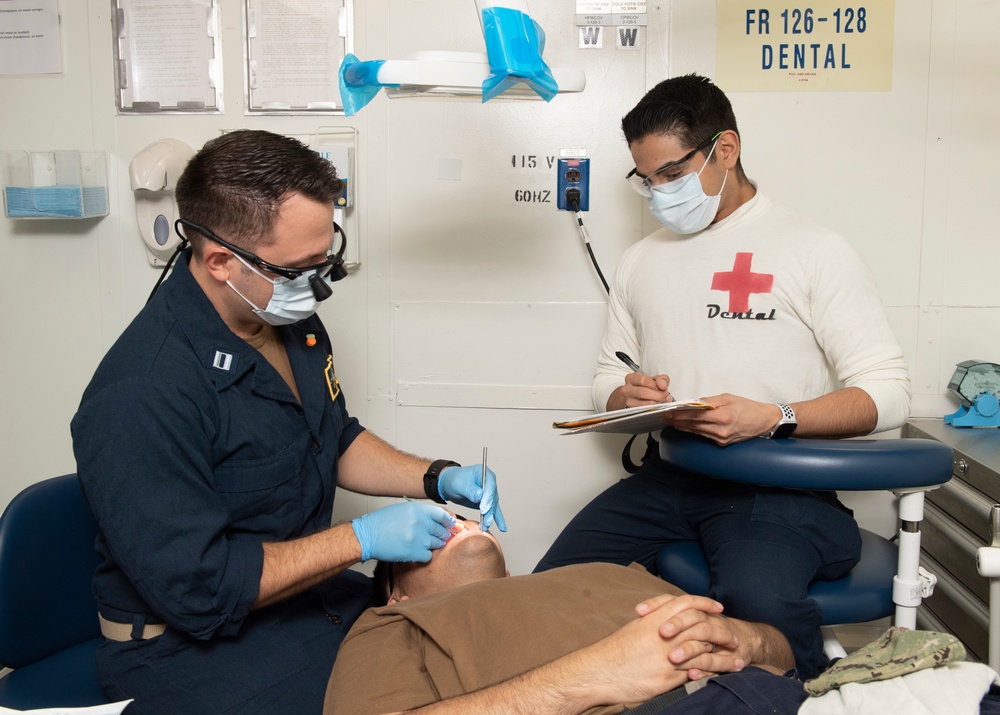 Sailors Conduct Dental Exams