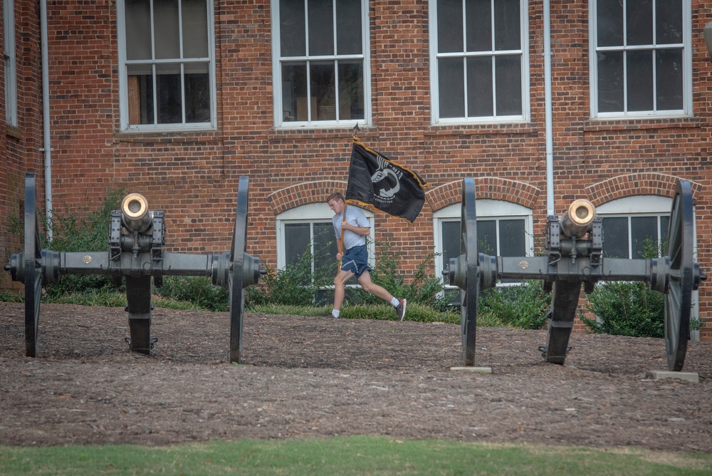 POW flag and cannons