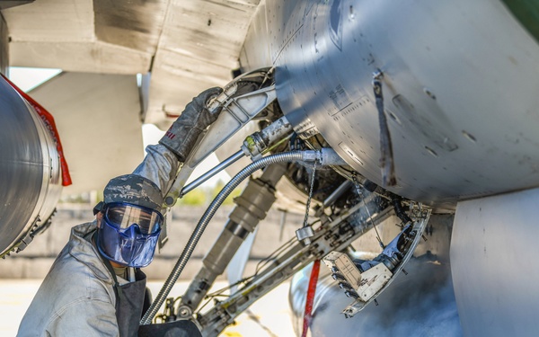 Airmen from 31st AMXS service LOX during NATO eAP