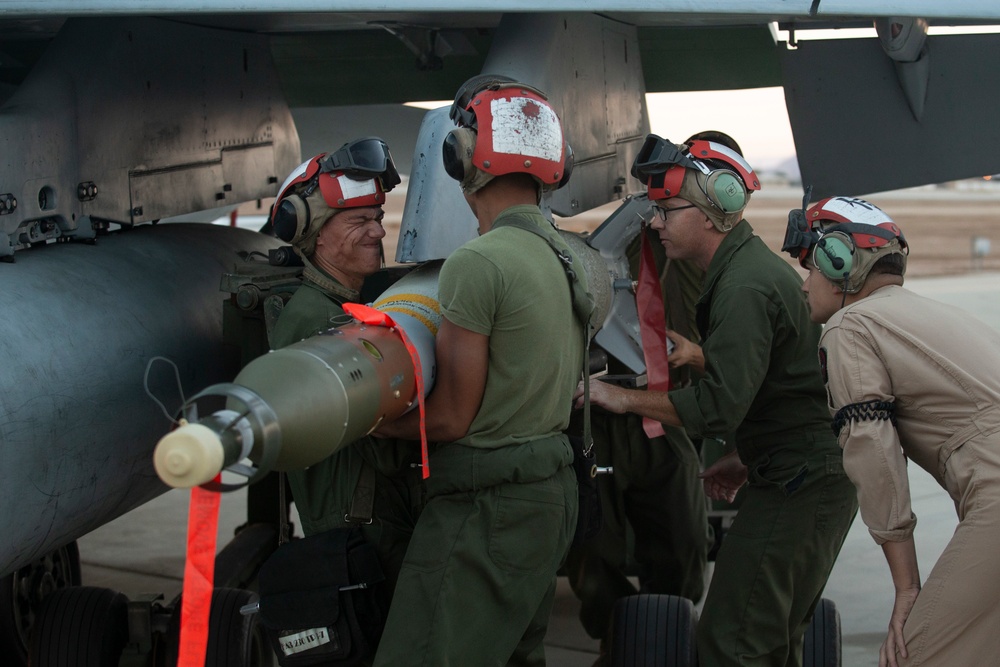 Ordnance Marines Load Bombs