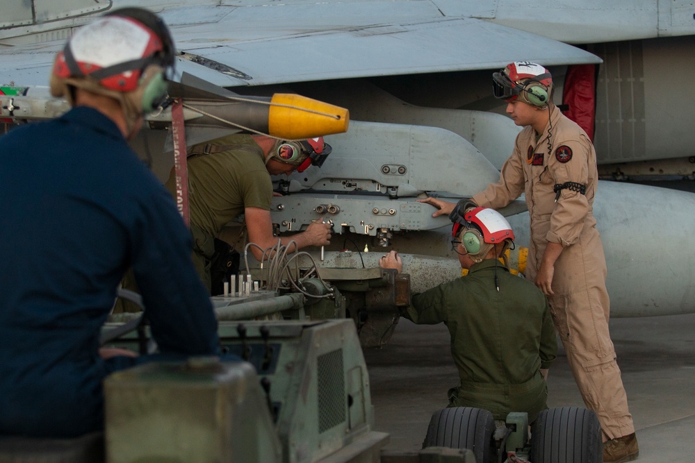 Ordnance Marines Load Bombs