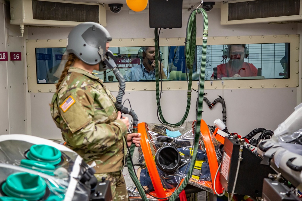 The U.S. Army Aeromedical Research Laboratory’s (USAARL) Enroute Care Group (ECG) and the U.S. Army Aviation School of Medicine (USASAM) preforms altitude testing on patient isolation units.