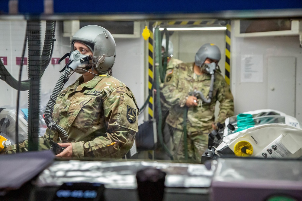 The U.S. Army Aeromedical Research Laboratory’s (USAARL) Enroute Care Group (ECG) and the U.S. Army Aviation School of Medicine (USASAM) preforms altitude testing on patient isolation units.