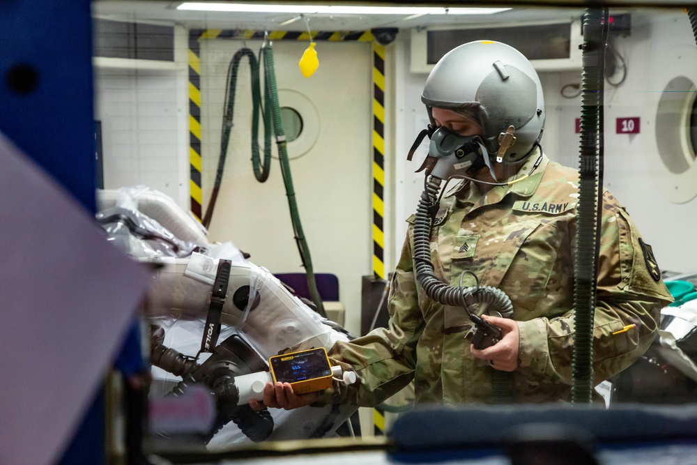 The U.S. Army Aeromedical Research Laboratory’s (USAARL) Enroute Care Group (ECG) and the U.S. Army Aviation School of Medicine (USASAM) preforms altitude testing on patient isolation units.