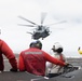 15th MEU Marines, USS San Diego Sailors unload helicopters while underway