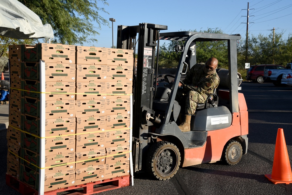 AZNG delivers food to school for local residents