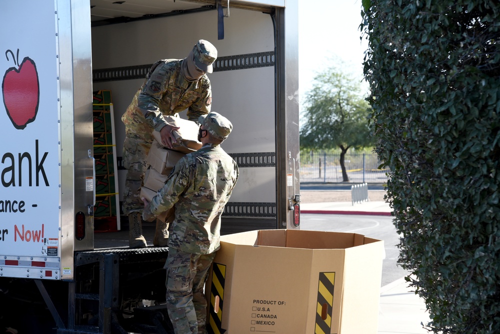 AZNG delivers food to school for local residents