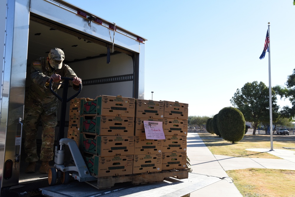 AZNG delivers food to school for local residents