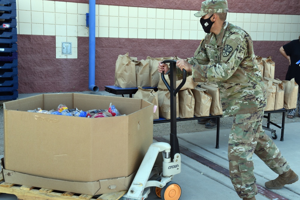 AZNG delivers food to school for local residents