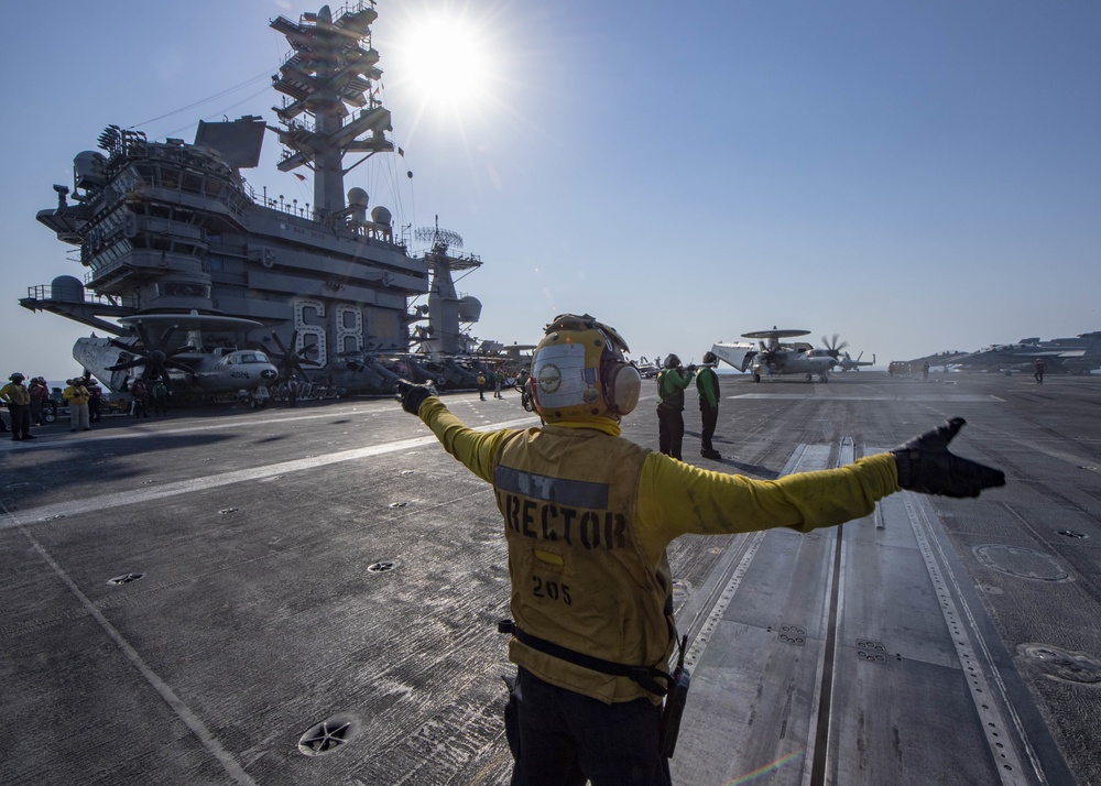 Sailor Directs E-2C Hawkeye