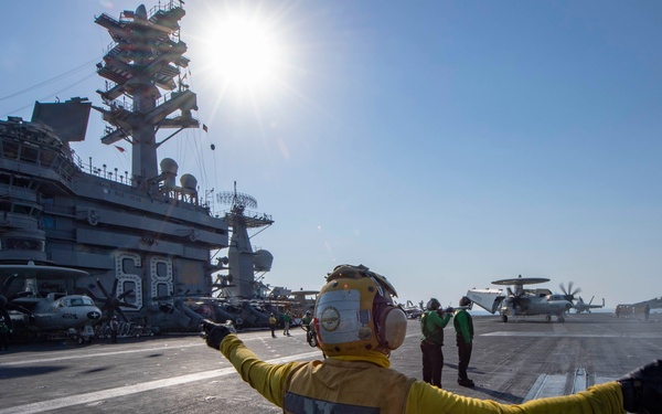 Sailor Directs E-2C Hawkeye